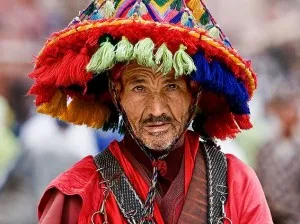 Sanction, an old magus garbed in layered cloth and silk, draped with talismans